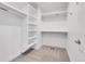 Spacious walk-in closet with built-in shelving and ample hanging space at 2544 Chase St, Edgewater, CO 80214