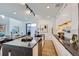 Contemporary kitchen with a spacious island and high-end finishes at 3829 Osage St, Denver, CO 80211