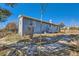 Landscaped backyard with stone pathway leading to home at 4482 S Argonne Ct, Aurora, CO 80015