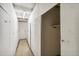 Hallway of storage units with numbered doors for residents at 590 N Logan St # 210, Denver, CO 80203