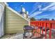 Small balcony with bistro table and chairs, overlooking the street at 970 S Dawson Way # 10, Aurora, CO 80012