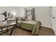 Cozy bedroom with a comfortable bed and built-in workspace at 970 S Dawson Way # 10, Aurora, CO 80012