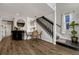 Bright dining area with a round table and chairs near the kitchen and stairs at 970 S Dawson Way # 10, Aurora, CO 80012