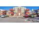 Front view of the building, showing the entrance and parking at 970 S Dawson Way # 10, Aurora, CO 80012