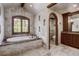 Luxurious bathroom with soaking tub, double vanity, and separate shower at 327 Peerless Dr, Breckenridge, CO 80424