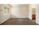Bright bedroom with neutral carpeting and bathroom access at 4608 Copeland Loop # 201, Highlands Ranch, CO 80126