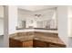 Kitchen features a granite countertop and breakfast bar at 4608 Copeland Loop # 201, Highlands Ranch, CO 80126