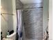 Updated bathroom with a tiled shower and curtain at 1103 Stage Dr, Fort Lupton, CO 80621