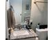 Bathroom with granite countertop, sink, and toilet at 1103 Stage Dr, Fort Lupton, CO 80621