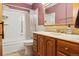 Bathroom with bathtub/shower, vanity with ample storage, and tile flooring at 585 S Alton Way # 4D, Denver, CO 80247