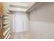 Walk-in closet with built-in shelves and ample storage space at 585 S Alton Way # 4D, Denver, CO 80247