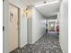 Building hallway leading to individual unit entrances at 585 S Alton Way # 4D, Denver, CO 80247