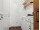 Laundry room with storage and washer/dryer hookups at 585 S Alton Way # 4D, Denver, CO 80247