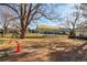 Outdoor pool area with a covered seating area, picnic tables, and horseshoe pits at 585 S Alton Way # 4D, Denver, CO 80247