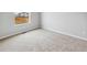 Well-lit bedroom with a window and view at 2204 Alyssa St, Fort Lupton, CO 80621