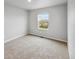 Spacious bedroom with window and backyard view at 2204 Alyssa St, Fort Lupton, CO 80621
