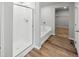 Modern bathroom with shower and soaking tub at 2204 Alyssa St, Fort Lupton, CO 80621