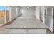 Kitchen island with granite countertop, offering extra prep and seating space at 2204 Alyssa St, Fort Lupton, CO 80621