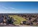 Aerial view of community and mountain views at 1993 S Xanadu Way, Aurora, CO 80014