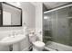 Updated bathroom with walk-in shower and modern vanity at 2272 Cherry St, Denver, CO 80207