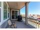 Covered deck with access to the interior and a view of the surrounding houses at 8742 Larch Trl, Parker, CO 80134