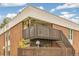 Brick building with private deck and stairs at 3663 S Sheridan Blvd # G12, Denver, CO 80235