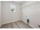 Laundry room with wire shelving and gray flooring at 1050 Joseph Pl, Erie, CO 80026