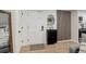 Entryway with white door, wood floors, and modern decor at 336 N Grant St # 206, Denver, CO 80203