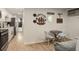 Dining area with small table and view into kitchen at 336 N Grant St # 206, Denver, CO 80203