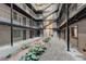 Shared courtyard with plants and gravel at 336 N Grant St # 206, Denver, CO 80203
