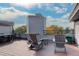 Relaxing rooftop deck with rocking chairs and table at 336 N Grant St # 206, Denver, CO 80203