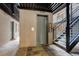 Building hallway with elevator and stairs access at 336 N Grant St # 206, Denver, CO 80203