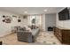 Living room with fireplace, wood floors, and southwestern decor at 336 N Grant St # 206, Denver, CO 80203