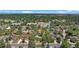 Aerial view showing property location in a residential neighborhood with a tennis court nearby at 6685 E Exposition Ave, Denver, CO 80224