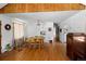 Bright dining room with hardwood floors and built-in hutch at 6685 E Exposition Ave, Denver, CO 80224