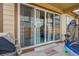 Patio with sliding glass doors leading to a fenced backyard at 9804 Truckee St, Commerce City, CO 80022