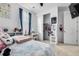 Spacious bedroom with a large closet and neutral color palette at 9804 Truckee St, Commerce City, CO 80022