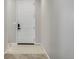 Simple entryway with neutral-toned flooring and walls at 9804 Truckee St, Commerce City, CO 80022