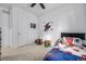 bedroom with Spiderman decor and ample closet space at 9804 Truckee St, Commerce City, CO 80022