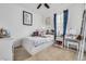 Charming bedroom with a bed, dresser, and plenty of natural light at 9804 Truckee St, Commerce City, CO 80022