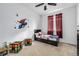 bedroom with Spiderman theme and built-in storage at 9804 Truckee St, Commerce City, CO 80022