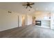 Main bedroom featuring a cozy fireplace, built-in shelves, and carpeted floors at 1304 5Th St, Golden, CO 80403