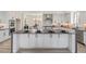 Gourmet kitchen boasting a large island and high-end finishes at 2680 Westview Way # 55, Superior, CO 80027