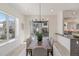 Modern dining room with sliding glass doors leading to a balcony at 2680 Westview Way # 55, Superior, CO 80027