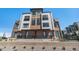 Modern three-story brick townhome with a metal balcony at 2680 Westview Way # 55, Superior, CO 80027