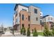 Modern three-story brick townhome with a metal balcony at 2680 Westview Way # 55, Superior, CO 80027