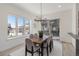 Elegant dining room with a wood table and chandelier at 2680 Westview Way # 55, Superior, CO 80027
