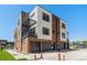 Modern brick building with attached garages and private balconies at 2680 Westview Way # 55, Superior, CO 80027