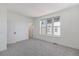 Spacious bedroom with large windows and neutral carpeting at 2680 Westview Way # 55, Superior, CO 80027