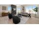 Bright and airy living room featuring a fireplace and large windows at 2680 Westview Way # 55, Superior, CO 80027